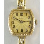 A VINTAGE LADIES 18CT YELLOW GOLD ROLEX WRISTWATCH with elegant guilloche dial bearing black