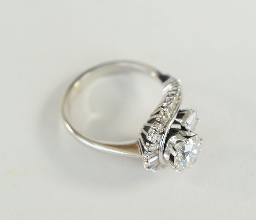 18CT WHITE GOLD DIAMOND RING having twist shank diamond setting, the central round brilliant cut - Image 5 of 5