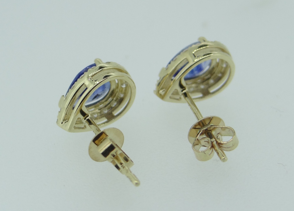 14CT YELLOW GOLD SAPPHIRE & DIAMOND EARRINGS featuring centre two-pear cut medium blue sapphire (1. - Image 2 of 3