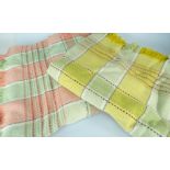 TWO WELSH WOOLEN BLANKETS both check pattern, one mainly green and yellow, the other green and pink