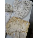 VICTORIAN PLASTER MAQUETTE of a heraldic shield with a goat's head, together with a plaque of a
