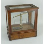 VINTAGE OERTLING OF LONDON CASED CHEMIST'S SCALES with bowl and weights in base drawer