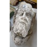 VICTORIAN PLASTER MAQUETTE, the head of a Saint resting on the head and wings of an Angel, 38cms