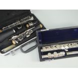 MODERN CASED CLARINET BY ODYSSEY, together with cased flute by T Jones