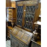 VINTAGE OAK LINEN-FOLD BUREAU BOOKCASE having two door glazed top, 175cms tall