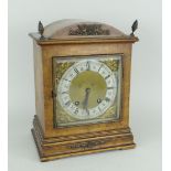 GOOD T.R RUSSELL OF LIVERPOOL WALNUT ENCASED ANTIQUE MANTEL CLOCK on a stepped base with dome top