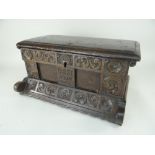 INTERESTING ANTIQUE CARVED OAK BOX, deep carved rosette and scrolls and centre panel initialled