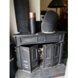 SUBSTANTIAL BLACK PAINTED CAST IRON FIRE with bi-folding doors Provenance: S A Brain & Co Ltd (