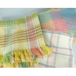 TWO WELSH WOOLEN BLANKETS check patterned, one mainly pink and white, the other green and yellow