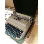 VINTAGE CASED REMINGTON MIRACLE TAB TYPEWRITER, together with a vintage portable Decker wind-up