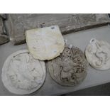 FOUR VICTORIAN PLASTER MAQUETTE ROUNDELS, one heraldic coat of arms, 25cms another a pelican,