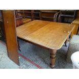 VICTORIAN MAHOGANY THREE LEAF EXTENDING DINING TABLE, faceted tapered supports and casters (177cms