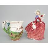 ROYAL DOULTON FIGURINE 'Autumn Breezes', together with a Wedgwood John Peel hunting jug
