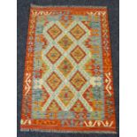 VEGETABLE DYED WOOL CHOBI KELIM RUNNER in rust and orange ground geometric pattern, 150 x 102cms