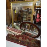 LARGE REPRODUCTION GILT FRAMED BEVELLED WALL MIRROR and another, and four sundry rugs