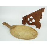 ROBERT THOMPSON MOUSEMAN CHEESE BOARD IN OAK, of oval form with elevated widening handle, carved