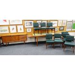 MID-CENTURY EXTENDING DINING TABLE, MATCHING CHAIRS & SIDEBOARD in teak-wood, the green leather