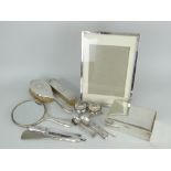 ASSORTED ENGLISH SILVER including rectangular easel-portrait frame 29.5 x 20.5cms, three-piece