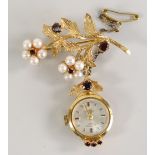 9CT GOLD LADIES ROTARY BAR BROOCH WATCH set with pearls and garnets, 11.1gms overall