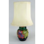 WILLIAM MOORCROFT POTTERY 'HIBISCUS' PATTERN TABLE LAMP with green / blue ground (ginger jar