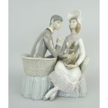 LLADRO PORCELAIN MODEL OF A COURTSHIP SCENE with two seated figures in a conversation-settee with