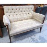 ANTIQUE MAHOGANY FRAMED SETTEE in multi-coloured flecked upholstery and with button backs (sold on
