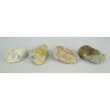 FOUR ITEMS OF BELIEVED CHINESE JADE ITEMS including toggle of naturalistic form with scroll-type