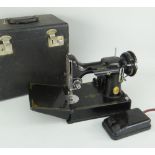 VINTAGE CASED SINGER SEWING MACHINE, electric driven, model number CAT.CAK6-12