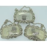 SET OF THREE SILVER DECANTER LABELS engraved for Whisky, Sherry and Port, Birmingham hallmarks,