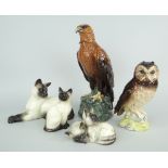 FIVE CERAMIC ANIMAL MODELS comprising Royal Doulton Golden Eagle Decanter for Whyte & Mackay 1984,