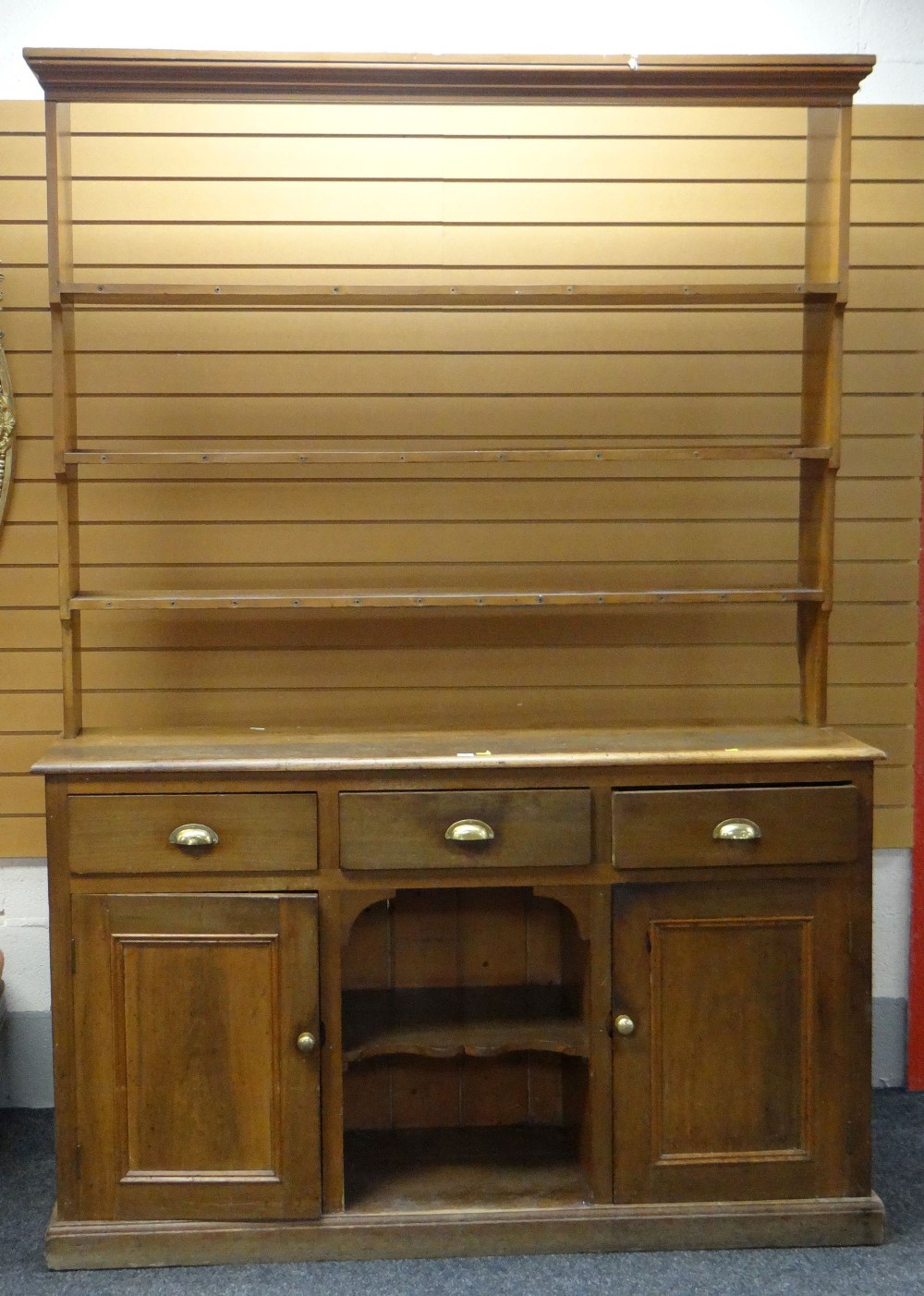 GOOD EARLY 20TH CENTURY PINE WELSH DRESSER, flanking cupboard base, three drawers and centre shelved