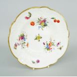 NANTGARW PORCELAIN SOUP DISH of alternate lobed form, the border moulded with ribbons, flowers and