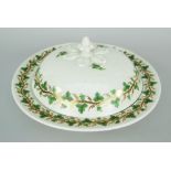 SWANSEA PORCELAIN MUFFIN DISH & COVER of circular form with acorn finial emerging from six leaves,