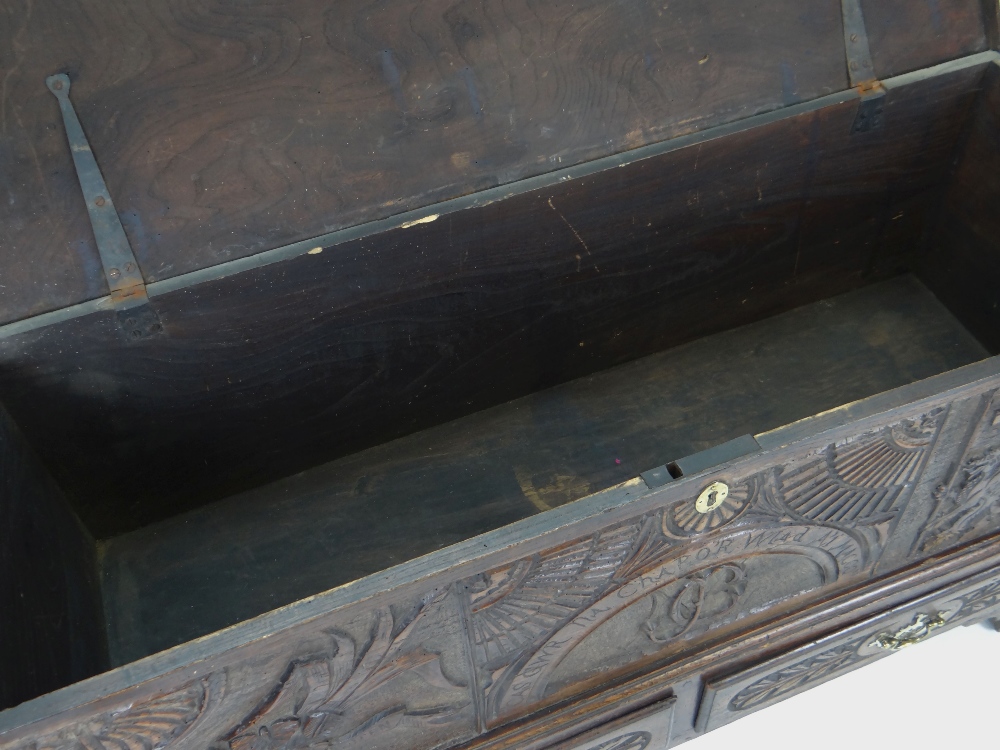 AN INTERESTING 19TH CENTURY WELSH OAK CARVED COFFER CHEST on bracket feet with two base drawers - Bild 4 aus 5