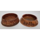 TWO EWENNY POTTERY SPITTOONS FOR BRAINS BREWERY both of circular form and slip inscribed 'RED DRAGON