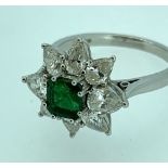 DIAMOND & EMERALD FLOWER HEAD CLUSTER RING, the central emerald (0.5 x 0.5cm) surrounded by eight