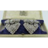 PAIR OF WHITE METAL ART DECO DIAMOND ENCRUSTED BROOCHES of bar and arrow head form with sterling