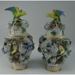 PAIR OF MEISSEN STYLE SCHNEEBALLEN COVERED VASES of urn form, the domed lids with surmounted