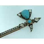 YELLOW & WHITE METAL DIAMOND AND TURQUOISE ENCRUSTED BAR BROOCH in the form of an antique axe in