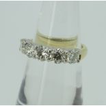 YELLOW AND WHITE METAL SET FIVE STONE DIAMOND RING, each stone approximately 0.25ct (1.25ct total