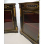 PAIR OF 19TH CENTURY PIER CABINETS ebony and gilt mounted including caryatids, single glazed door,