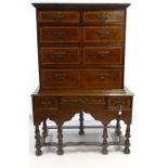 EARLY 19TH CENTURY OAK MARQUETRY CHEST ON STAND the base with three drawers, turned supports and