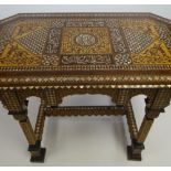 ISLAMIC INTARSIA TABLE of octagonal form, mother-of-pearl inlay and marquetry all round, the top