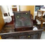 VINTAGE CONTINENTAL MAHOGANY HANGING CORNER WALL CUPBOARD with four section green glass door, centre