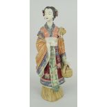 JAPANESE POTTERY GEISHA FIGURE kimono in polychrome glaze, holding fan and food canteen,