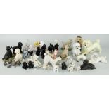 APPROXIMATELY THIRTY CERAMIC & OTHER SMALL POODLE MODELS