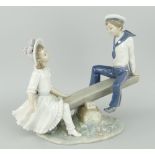 LLADRO SEA-SAW MODEL with boy in sailors outfit and girl in summer-dress, 28cms long