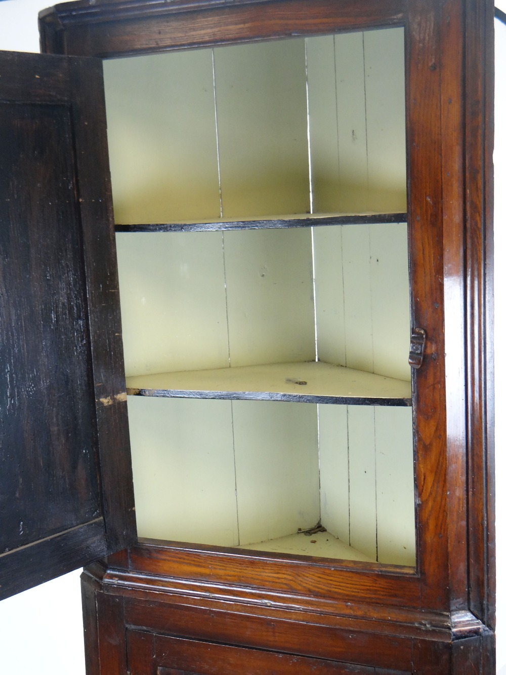 ANTIQUE STANDING TWO STAGE CORNER BLIND-CUPBOARD the top section with panelled door in elm, turned - Image 2 of 3