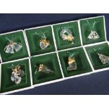 EIGHT BOXED SWAROVSKI CRYSTAL 'CHRISTMAS MEMORIES' TREE ORNAMENTS