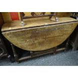 19TH CENTURY OAK OVAL GATE-LEG TABLE, 103cms diameter